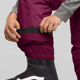North Face Girls Freedom Insulated Pant 2024 - A pair of insulated ski pants with a black waistband and zipper fly, worn by an adult model.