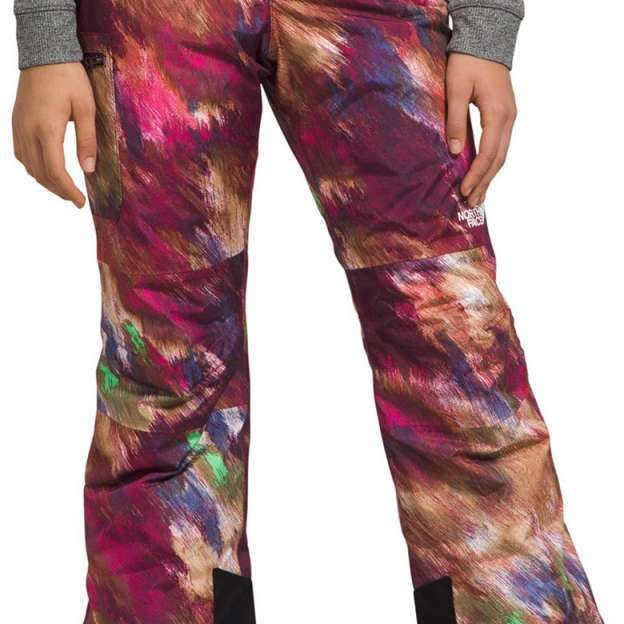 North Face Girls Freedom Insulated Pant 2024 - A pair of insulated ski pants with a colorful abstract pattern in shades of pink, purple, and brown.