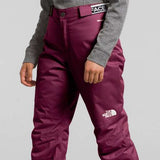 North Face Girls Freedom Insulated Pant - A pair of insulated ski pants with a white logo on the left thigh and a black zipper pull on the right side.