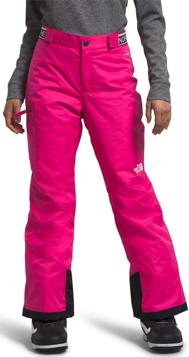North Face Girls Freedom Insulated Pant 2024 - A pair of bright pink snow pants with a white logo on the left thigh and black trim around the cuffs.