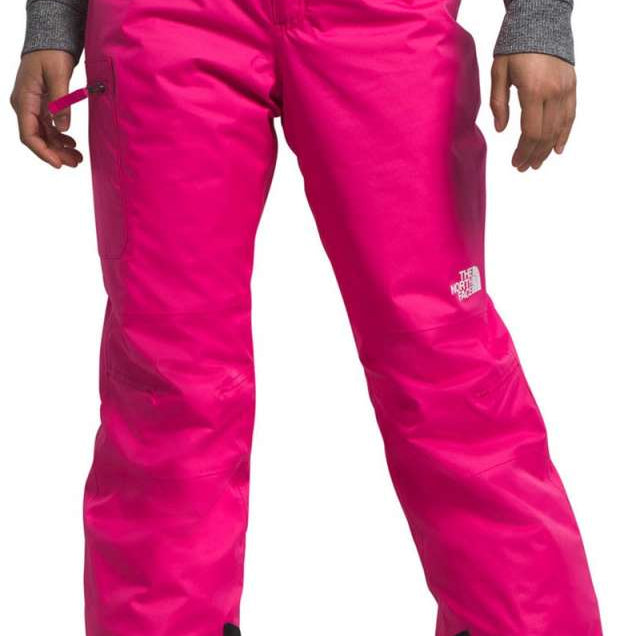 North Face Girls Freedom Insulated Pant 2024 - A pair of bright pink snow pants with a white logo on the left thigh and black trim around the cuffs.