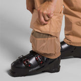 North Face Freedom Stretch Pants 2024 - A pair of tan-colored pants with a mesh pocket on the side.