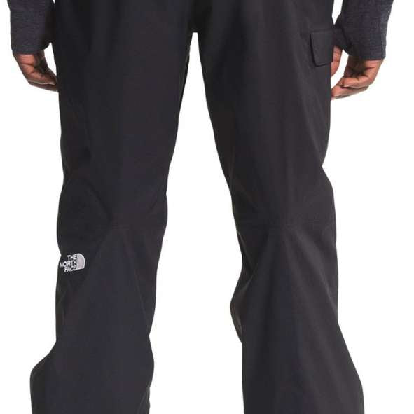 North Face Freedom Stretch Pants - Black pants with a white logo on the left thigh.