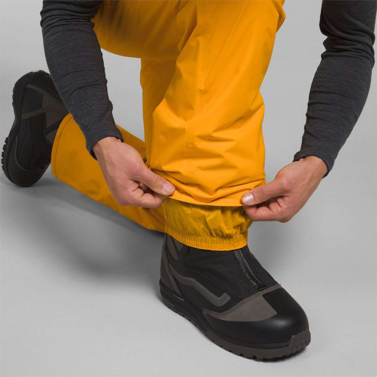 North Face Freedom Stretch Pants - These pants are yellow with a subtle black stripe on the side of each leg.