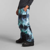 North Face Freedom Stretch Pants 2024 - A pair of black snow pants with a subtle white pattern and a zippered pocket on the thigh.