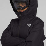 North Face Girls Freedom Insulated Jacket 2024 - A black jacket with a white logo on the left chest and a zipper down the front.