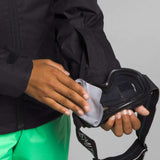 North Face Girls Freedom Insulated Jacket 2024 - A black jacket with a white logo on the left chest and a zipper down the front.