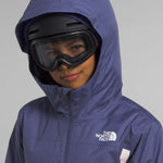 North Face Girls Freedom Insulated Jacket 2024 - A dark blue jacket with a white logo on the left chest and a zipper down the front.