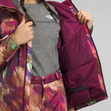 North Face Girls Freedom Insulated Jacket 2024 - A dark-colored jacket with a white logo on the chest and a zipper down the front.