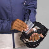 North Face Girls Freedom Insulated Jacket 2024 - A navy blue jacket with a white logo on the left chest and two zippered pockets on either side of the waist.