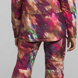 North Face Girls Freedom Insulated Jacket 2024 - A multicolored jacket with a hood, featuring a pink and purple abstract pattern on a light brown background.