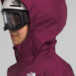 North Face Girls Freedom Insulated Jacket 2024 - A dark-colored, insulated jacket with a hood and zippered pockets on the front.