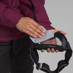 North Face Girls Freedom Insulated Jacket 2024 - A girl's insulated jacket with a bold, red and black plaid pattern on the sleeves and chest.