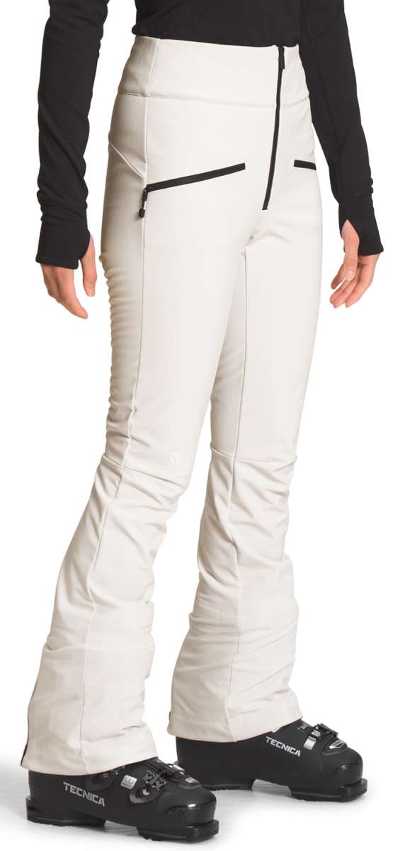 North Face Ladies Amy Softshell Pant - Beige softshell pants with black zipper on left hip and zippered pocket on right thigh.