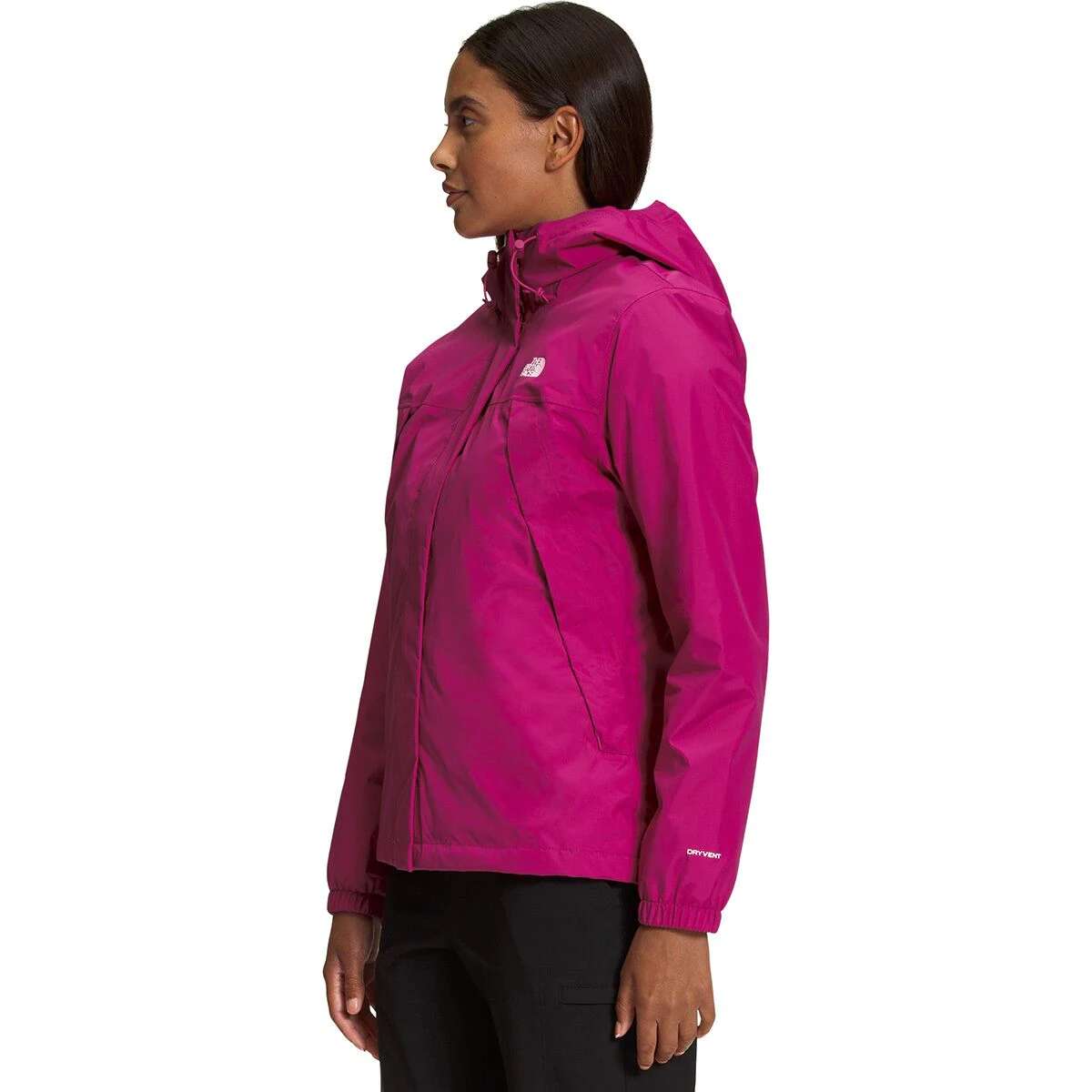 North Face Women's Antora Triclimate Shell Jacket - A woman wearing a pink jacket with a white logo on the left chest and a hood, standing against a light gray background.