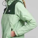North Face Ladies Antora Triclimate Shell Jacket - A light green jacket with a darker green panel on the chest and shoulder area, featuring a hood and zipper closure.