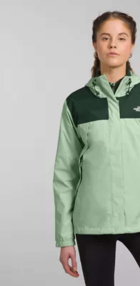 North Face Ladies Antora Triclimate Shell Jacket - A light green jacket with a darker green panel across the chest and hood, featuring a white logo on the upper left side of the chest panel.