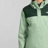 North Face Ladies Antora Triclimate Shell Jacket - A light green jacket with a darker green panel across the chest and hood, featuring a white logo on the upper left side of the chest panel.