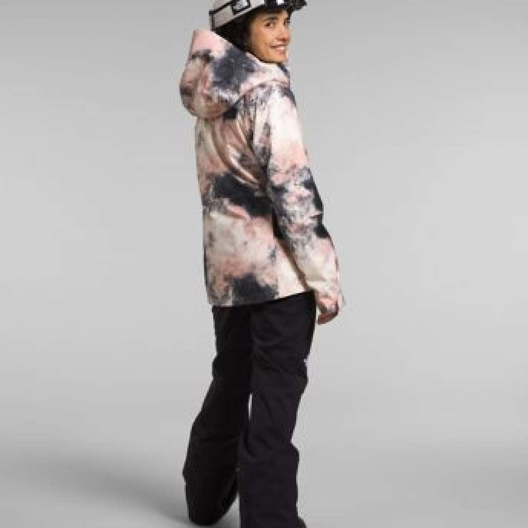 North Face Ladies Thermal Eco Snow Triclimate Jacket 2024 - A light pink jacket with a darker pink and black abstract pattern, worn by a model facing away from the camera.