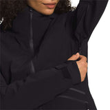 North Face Women's Inclination Shell Jacket - A black jacket with a high collar and zippered pockets, featuring a logo on the left chest area.