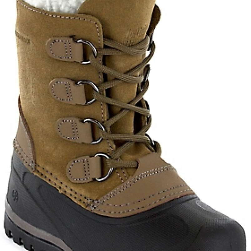 Northside Back Country insulated Boot 2024 - A tall, tan suede boot with a thick black sole and white fleece lining visible at the top.