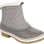 Northside Women's Morgan Crest Insulated Boot 2024 - A gray boot with a quilted pattern on the upper portion and a white faux-fur trim around the top edge.