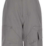 Obermeyer Juniors Volt Insulated Pant 2024 - Light gray insulated ski pants with a black logo on the left leg and adjustable Velcro straps at the waist.