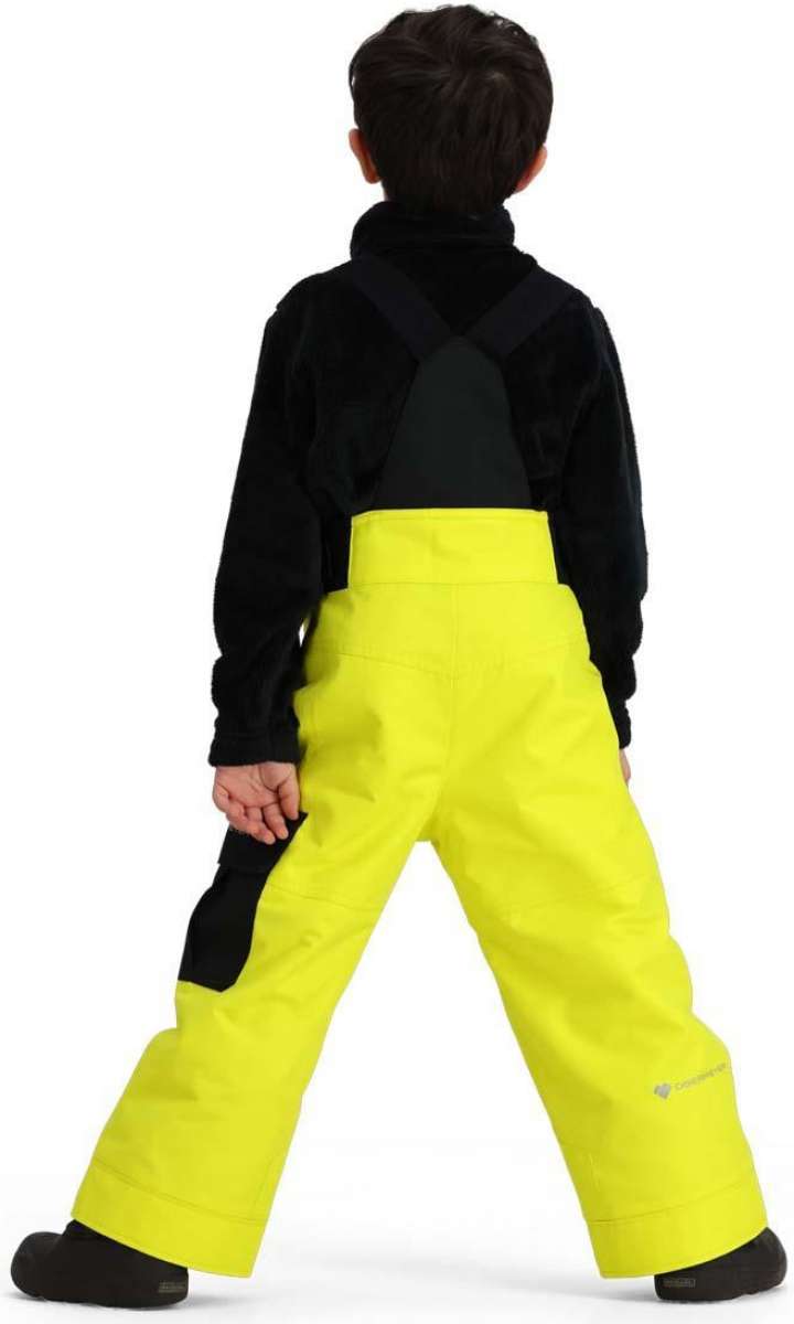 Obermeyer Juniors Volt Insulated Pant 2024 - Bright yellow insulated ski pants with black accents on the side and back pockets.