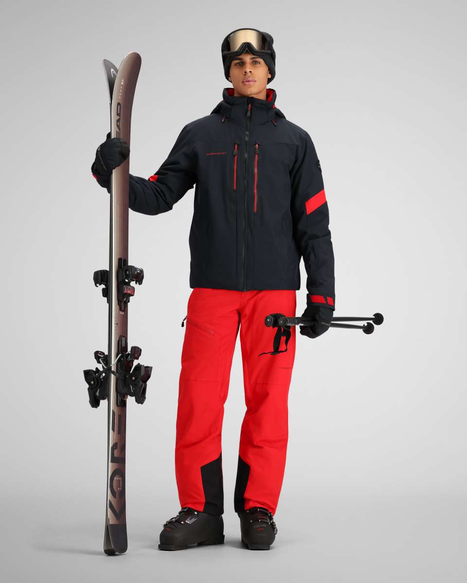 Obermeyer Fall Line Insulated Jacket 2024 - A black jacket with red accents and a zippered chest pocket.