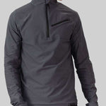 Obermeyer Flex 1/4 Zip T-Neck 2023 - A dark gray zippered pullover with a high collar and long sleeves.