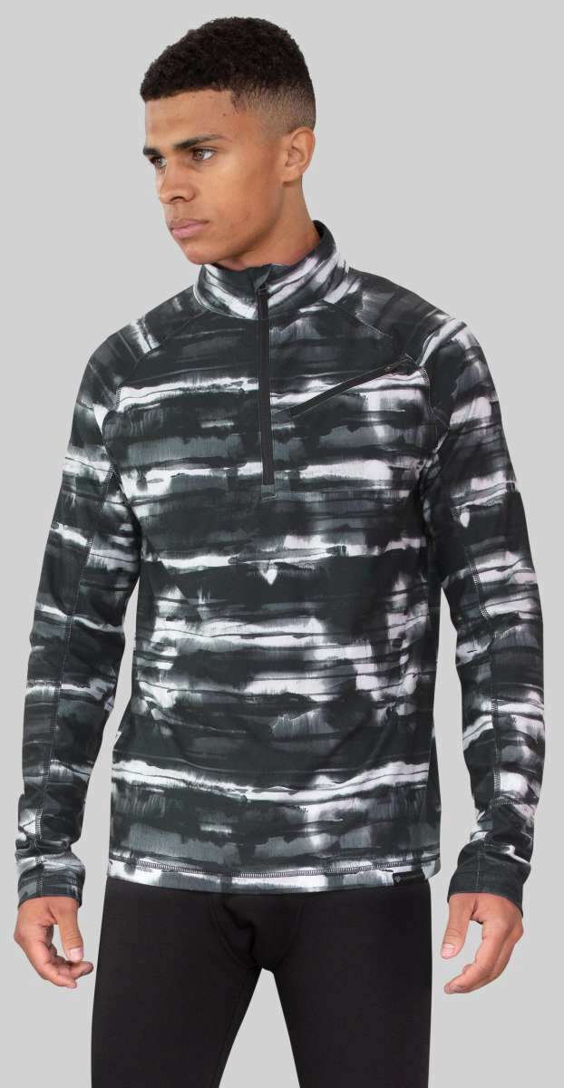 Obermeyer Flex 1/4 Zip T-Neck 2023 - A black and white tie-dye patterned quarter zip pullover with a high collar.