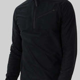 Obermeyer Flex 1/4 Zip T-Neck 2023 - Black fleece quarter-zip sweater with a high collar and zip closure at chest.