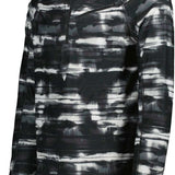 Obermeyer Flex 1/4 Zip T-Neck 2023 - A black and white quarter-zip pullover with a high collar, featuring horizontal stripes on the chest and sleeves.