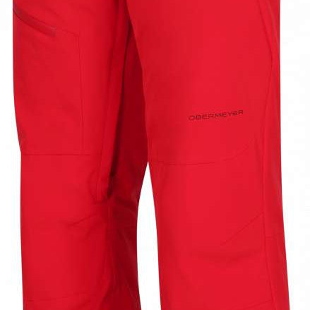 Obermeyer Force Insulated Pant Short 2024 - A pair of red insulated ski pants with two black buttons on the waistband.