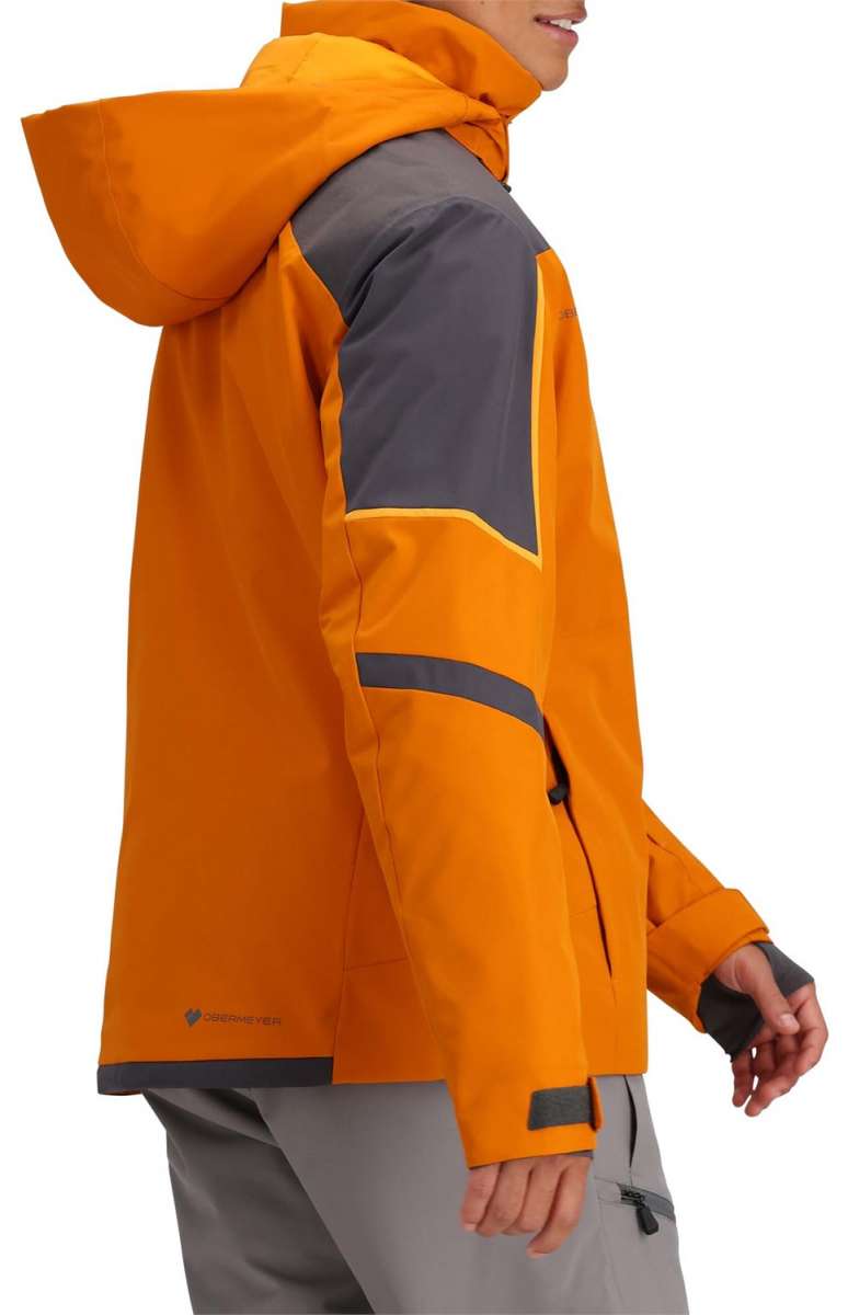 Obermeyer Foundation Insulated Jacket Tall 2024 - A bright orange jacket with a gray chest panel and yellow trim, worn by a model from the waist up against a white background.
