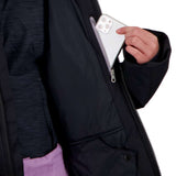 Obermeyer Girls Rylee Insulated Jacket 2022 - A black insulated jacket with a zippered chest pocket and two front pockets, featuring a white logo on the left sleeve.