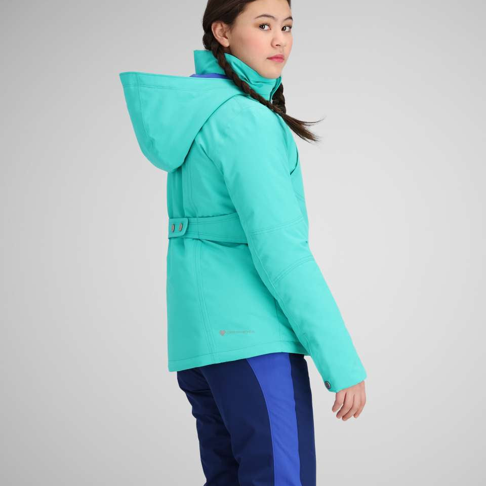 Obermeyer Girls Rylee Insulated Jacket 2024 - A bright turquoise jacket with a high collar and belt, worn by a girl with brown hair in braids.