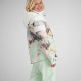 Obermeyer Girls Taja Print Insulated Jacket 2024 - A pastel-colored jacket with a purple and pink abstract floral pattern, featuring a hood and zippered pockets.