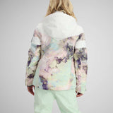 Obermeyer Girls Taja Print Insulated Jacket 2024 - A pastel-colored jacket with a purple and pink abstract pattern, featuring a hood and white accents on the shoulders.