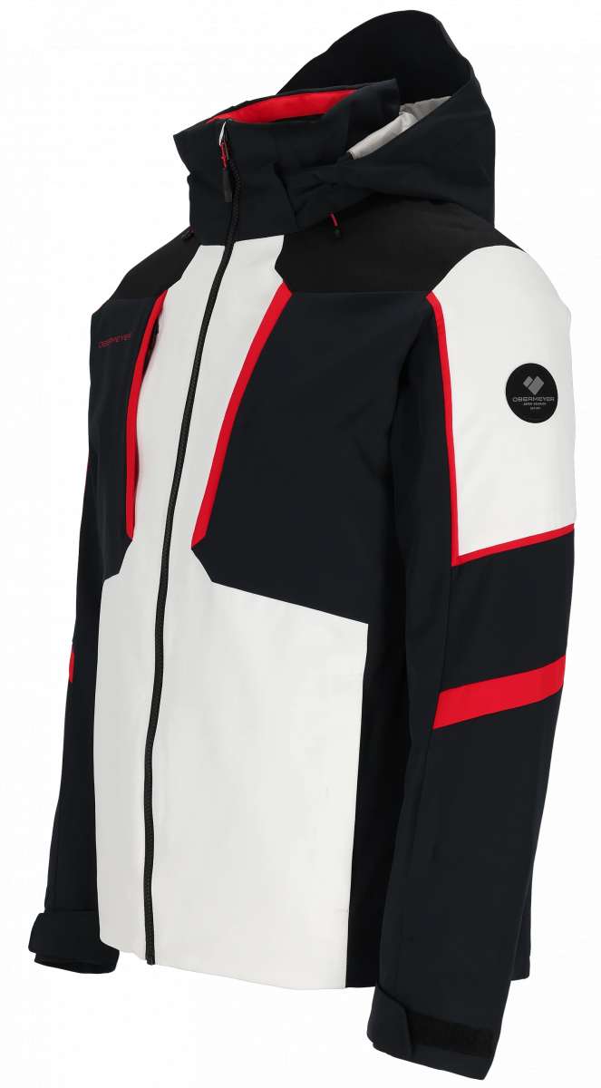 Obermeyer Foundation Insulated Jacket 2024 - A black insulated jacket with a white logo on the left chest and red accents along the zipper, cuffs, and hood.