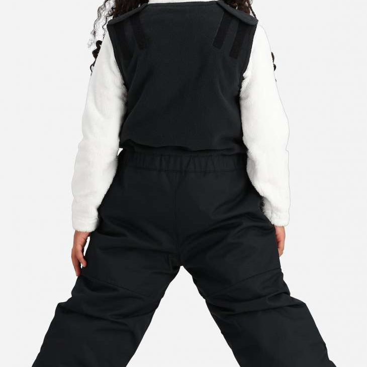 Obermeyer Kids Outer Limits Insulated Bib 2024 - A black insulated bib with a white logo on the left leg and a small pocket on the right side.