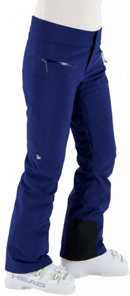 Obermeyer Women's Bliss Insulated Pant Short 2024 - A pair of navy blue ski pants with a zippered pocket on the left side, featuring a small silver zipper pull.