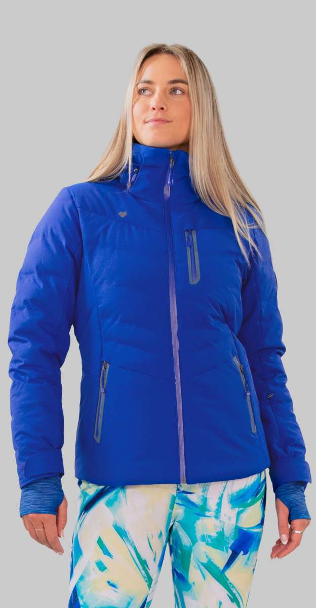 Obermeyer Women's Cosima Down Jacket - A royal blue down jacket with a high collar and zippered pockets.