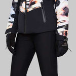 Obermeyer Women's Cosima Down Jacket - A black down jacket with a white and orange abstract pattern on the upper body portion.