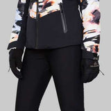Obermeyer Women's Cosima Down Jacket - A black down jacket with a white and orange abstract pattern on the upper body portion.