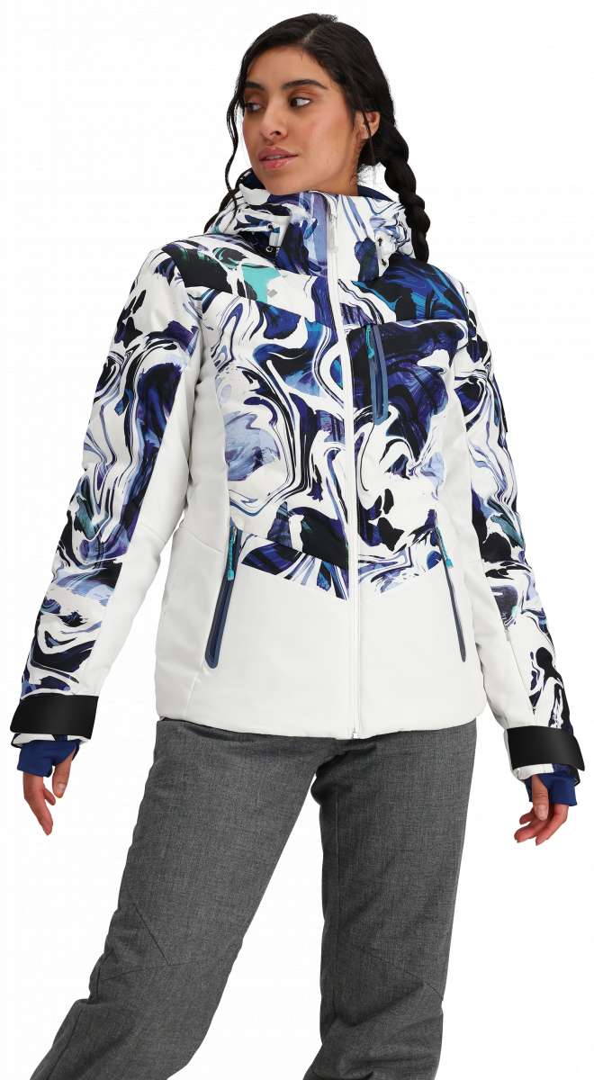 Obermeyer Women's Cosima Down Jacket - A white down jacket with a blue and black abstract pattern on the front, featuring a high collar and zippered pockets.