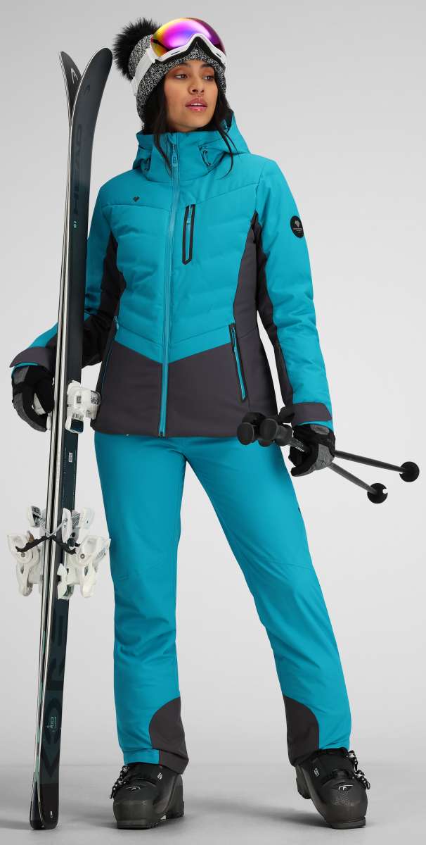 Obermeyer Women's Cosima Down Jacket - A bright blue down jacket with a high collar and zippered pockets, featuring a black zipper pull on one pocket.