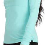 Obermeyer Women's Discover Quarter Zip Top 2024 - A light blue quarter-zip top with a black zipper and collar, worn by a model on a solid white background.
