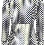 Obermeyer Women's Discover Quarter Zip Top 2024 - A white quarter-zip top with a repeating pattern of black half-moons and black trim along the zipper.