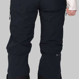 Obermeyer Women's Emily Insulated Pant Short 2023 - Black snow pants with zippered pockets and adjustable waistband, worn by a model from behind.